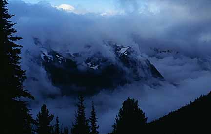 Image of some clouds and sea mist around the Olympic Mountains, WA.