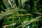 Image showing an aerial view of a third-order stream entering a fourth-order stream.  This image links to a more detailed image.